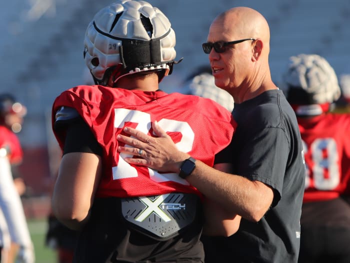 Brent Helton chatting with Matt Lance.